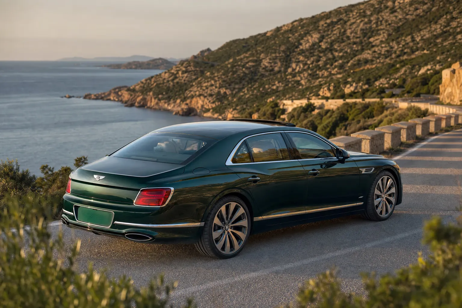 Bentley Flying Spur su strada costiera in Sardegna